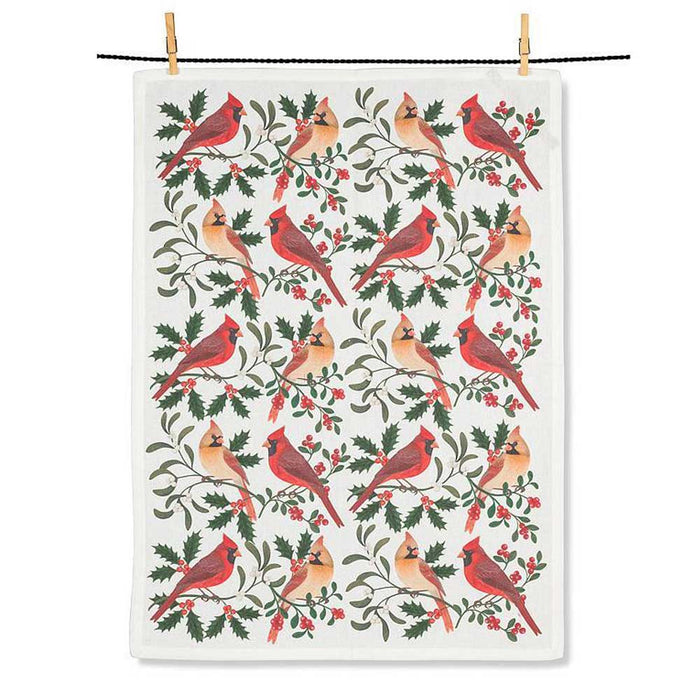 Cardinals & Berries Kitchen Towel featuring a white towel with a repeating pattern of cardinals perched on holly branches with red berries.