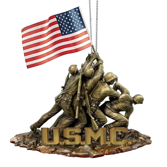 The United States Marine Corps Iwo Jima Ornament features a bronze-colored depiction of US Marines raising the American flag, inspired by the iconic Iwo Jima Memorial and accented with USMC letters at the base. This detailed ornament makes a meaningful military Christmas ornament or tribute piece, honoring the bravery and sacrifice of the US Marine Corps.