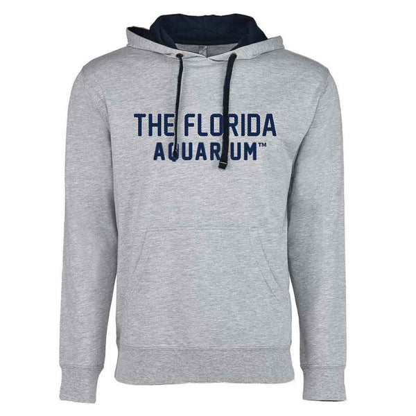 The Florida Aquarium Tackle Twill Hooded Sweatshirt is a light gray unisex hoodie with THE FLORIDA AQUARIUM™ in bold navy letters on the front, a roomy pocket, and dark drawstrings for style.