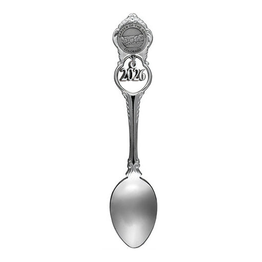 A decorative silver Garden of the Gods Spoon with Bear Charm makes a unique Colorado souvenir, featuring the State of Colorado and an image of a bear on the handle, as well as 2026 engraved below the emblem.