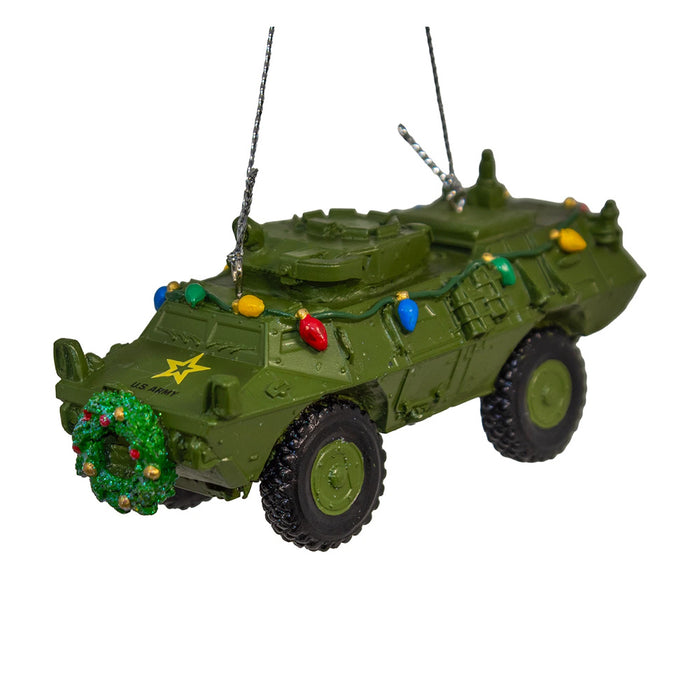 Military Vehicle with Lights Ornament: a green military vehicle Christmas tree ornament decorated with a front wreath and a string of multi-colored holiday lights.