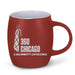 The 360 CHICAGO Magnicity Etched Barrel Mug is a red mug featuring a white graphic of a building and the text “360 Chicago: A Magnicity Experience” on its side, perfect for fans of Chicago’s iconic skyline.