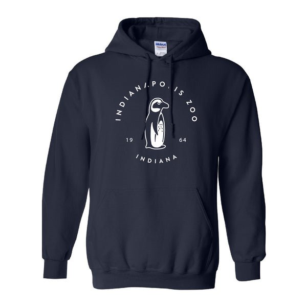Indianapolis Zoo Simple Penguin Hooded Sweatshirt in navy blue, featuring a white circular logo with a penguin illustration and the text “INDIANAPOLIS ZOO INDIANA 1964.” This hoodie includes a front pocket and drawstrings, making it an ideal choice for supporting penguin conservation at the Indianapolis Zoo.