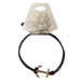 The Adjustable Cord Bracelet with USS Constitution Copper Anchor Charm features a black cord and small anchor made from reclaimed USS Constitution copper, presented on a card with a ship illustration and Boston, MA details.