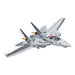 The Top Gun F-14A Tomcat Fighter Set features a gray toy jet with swept wings, two pilots visible in the cockpit, and orange engine flames, depicted soaring mid-flight against a white background.