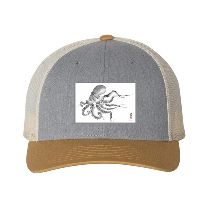 Grey and tan trucker hat featuring a rectangular patch with a black and white ink drawing of an octopus.