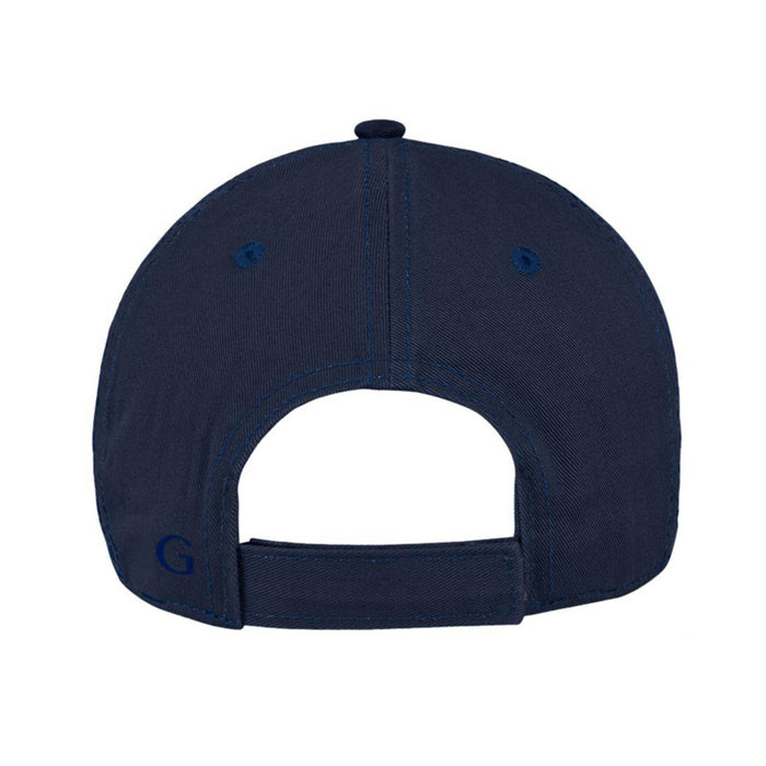 Navy blue Intrepid Museum Flags Cap viewed from the back, featuring an adjustable strap and a small embroidered G on the lower left side—a subtle nod to naval heritage inspired by classic museum cap designs.