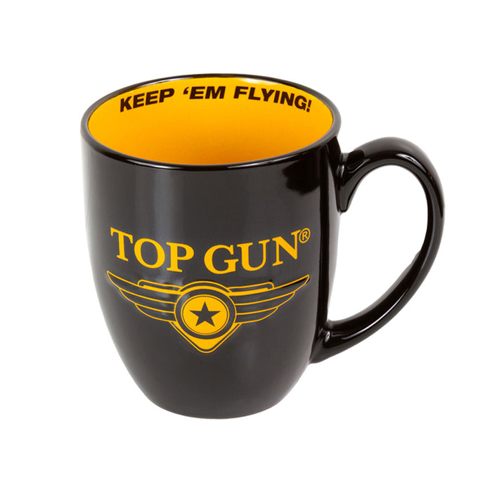 Introducing the Top Gun Keep ’Em Flying Mug—a must-have for fans and collectors alike. This official mug showcases a bold black exterior with the iconic TOP GUN and yellow winged star logo on the front. The interior features a bright yellow finish, complemented by “KEEP EM FLYING!” printed in vibrant yellow along the inside rim.