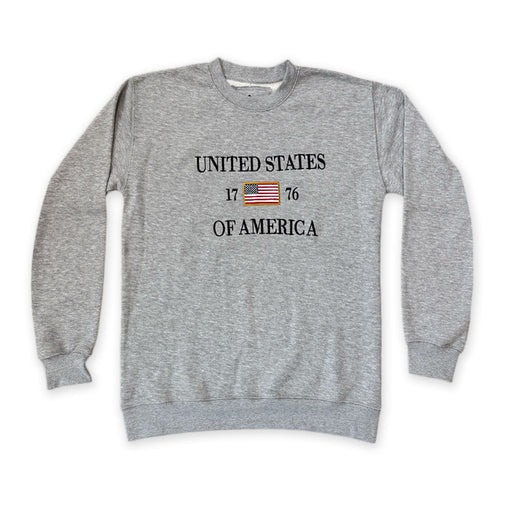 The United States Icon Crew Sweatshirt is a gray patriotic top with "UNITED STATES OF AMERICA," an American flag, and "1776" printed across the front—ideal apparel for anyone who loves American history.