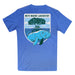 The Mote Marine Laboratory Manatee Organic T-Shirt is crafted from soft organic cotton and features a prominent back patch reading “Mote Marine Laboratory.” Its design highlights an illustrated manatee swimming by mangroves beneath a blue sky, celebrating marine conservation.
