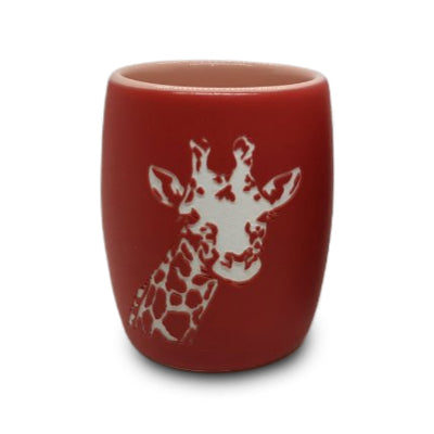 The Living Desert Zoo and Gardens Giraffe Etched Shot Glass features a white illustration of a giraffe’s head and neck, inspired by giraffe conservation efforts at the Living Desert Zoo.