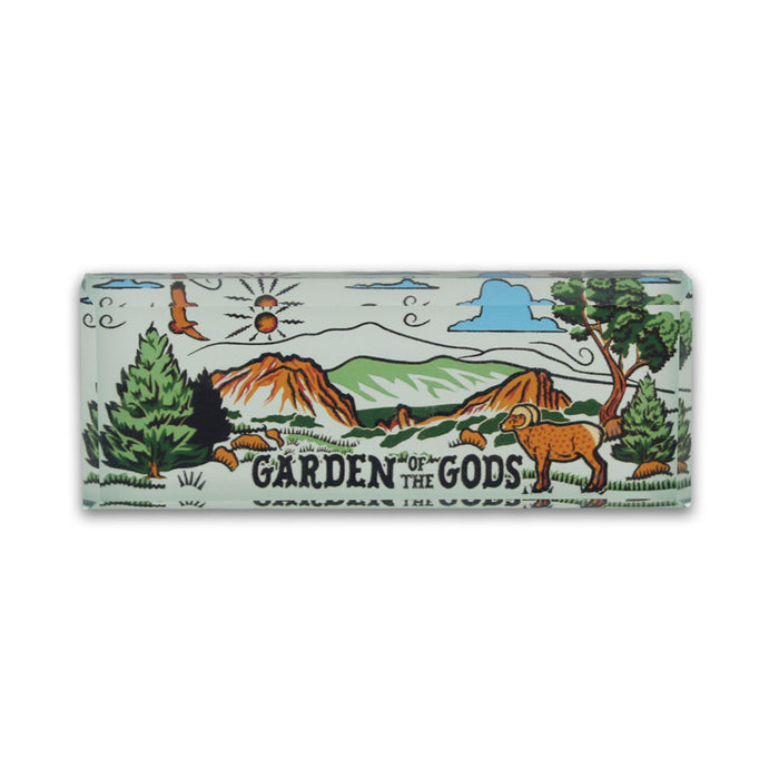 Garden of the Gods Feeling Folksy Glass Magnet featuring striking red rock formations, illustrated mountains, trees, a sun, an eagle in flight, and a bighorn sheep in the foreground with “Garden of the Gods” text.