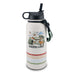 The Garden of the Gods Feeling Folksy Water Bottle is a white, eco-friendly bottle with a black lid, patterned bands, and a textured carrying handle. It showcases a colorful landscape illustration with mountains, sun, trees, animals, and the text “Garden of the Gods.”.