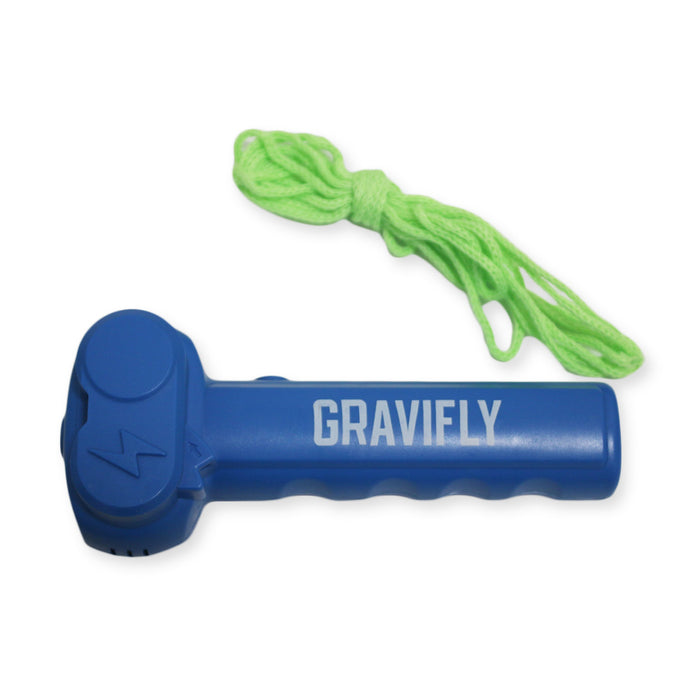 The Genius at Play GraviFly Rope Launcher, a blue handheld device with a lightning bolt symbol, rests next to a coiled neon green cord. This gravity-defying design is part of the GraviFly Rope Launcher collection.