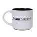 White ceramic Marie Selby Botanical Gardens Calder Nature of Movement Mug with black interior, featuring "SELBY GARDENS - THE LIVING MUSEUM - DOWNTOWN SARASOTA" printed in black on the side.