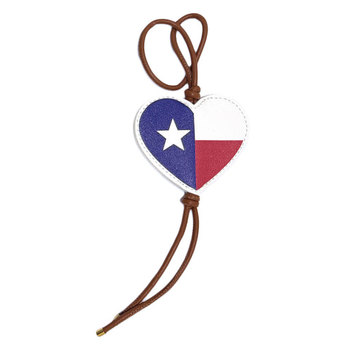 The Texas Flag Bag Clip is a heart-shaped keychain with a Texas state flag design and a brown leather loop—an ideal accessory for any Lone Star State collection.