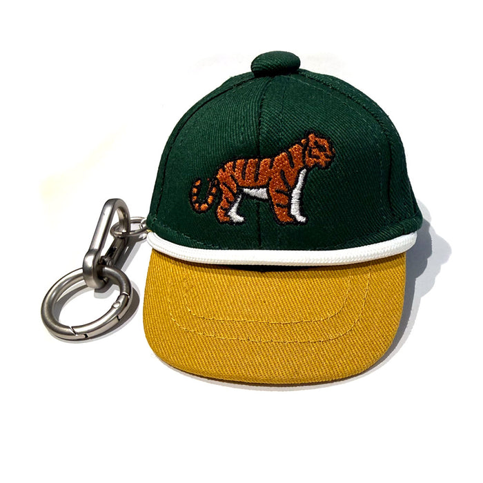 The Tiger Mini Cap Bag Clip is a small green and yellow keychain featuring an embroidered tiger on the front, a metal keyring for easy attachment, and is pictured on a white background.