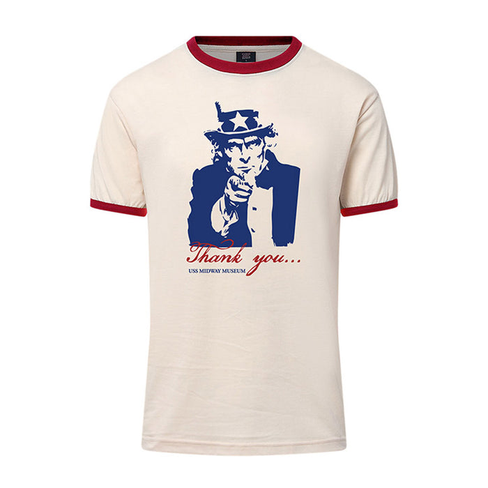 Show your appreciation for naval aviation history with the USS Midway Museum Uncle Sam Ringer T-Shirt. This beige tee features red trim, a striking blue Uncle Sam graphic pointing forward, and bold red lettering below that reads “Thank you... USS Midway Museum.” Inspired by the legendary USS Midway Museum, this unique design makes a statement of gratitude and pride.