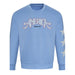 The USS Midway Museum American Concert Tour Crew Sweatshirt features a light blue color with “AMERICA SINCE 1776” in decorative lettering on the chest and three white stars on the left sleeve, drawing inspiration from the proud legacy of American naval aviation history and echoing classic styles found in San Diego’s USS Midway Museum sweatshirt collection.