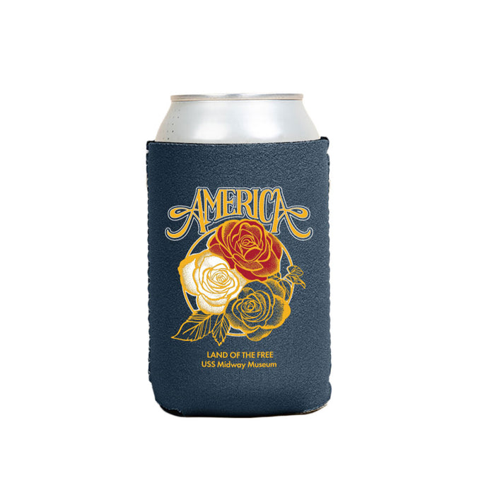 A silver can sits in the USS Midway Museum America Land of the Free Roses Koozie, featuring “America” above vibrant red and white roses. Beneath, the text reads: Land of the Free, USS Midway Museum—honoring naval history with every sip.