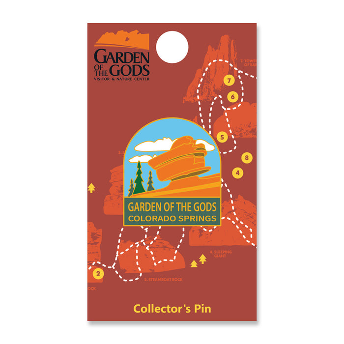 Introducing the Garden of the Gods Balanced Rock Pin—an illustrated collector’s pin featuring the iconic Balanced Rock of Colorado Springs, displayed on a vibrant red card. The design showcases rock formations, a map with numbered points reminiscent of playing cards, and highlights the Visitor & Nature Center logo.