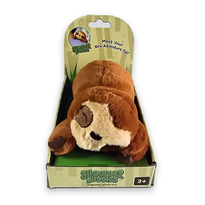A brown Sloth Shoulder Buddy Plush in green cardboard packaging that reads Meet Your New Adventure Pal! and includes a magnetic plush toy.