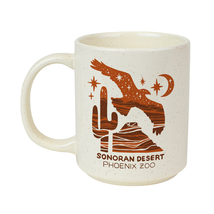 Cream-colored speckled mug featuring a graphic of a desert landscape, a cactus, and a hawk under a crescent moon, with the text SONORAN DESERT PHOENIX ZOO printed below.