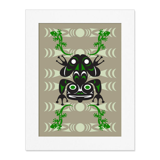 A stylized frog with bold black, green, and white patterns is centered on a tan background with leaf and geometric motifs in the Woodland Park Zoo Jason LaClair Matte Print by Lummi artist Jason LaClair, framed by a white mat.