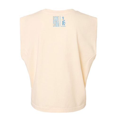 Beige sleeveless top shown from the back, featuring a small blue Desert Botanical Garden graphic and logo near the neckline. Inspired by the Desert Botanical Garden Will Beger Hummingbird Women's T-Shirt collection, this eco-friendly tee is both stylish and environmentally conscious.
