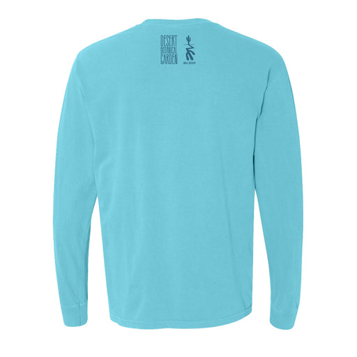 A light blue long-sleeve Desert Botanical Garden Will Beger Cactus T-Shirt seen from the back, featuring small black text and a stick-figure design near the neck that reads Desert Botanical Garden Wild Rising.