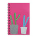 Introducing the Desert Botanical Garden Will Beger Green & Blue Cactus Notebook—a spiral-bound notebook with a bright pink cover adorned with two illustrated potted cacti: one nestled in a patterned gray pot and the other in a simple white pot, inspired by the vibrant flora of the Desert Botanical Garden.