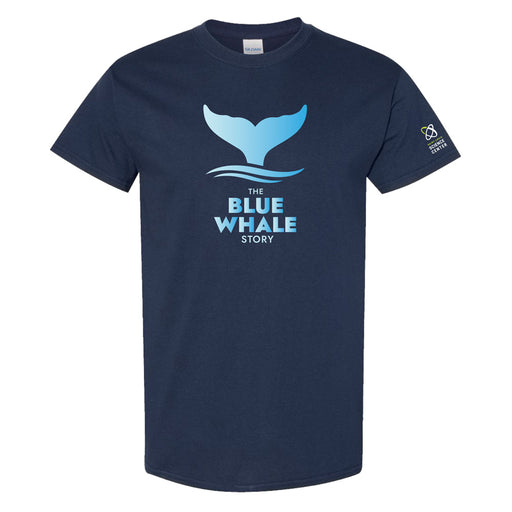 Navy blue t-shirt with a light blue whale tail graphic above stylized waves and the text THE BLUE WHALE STORY on the front. A small logo is on the left sleeve.