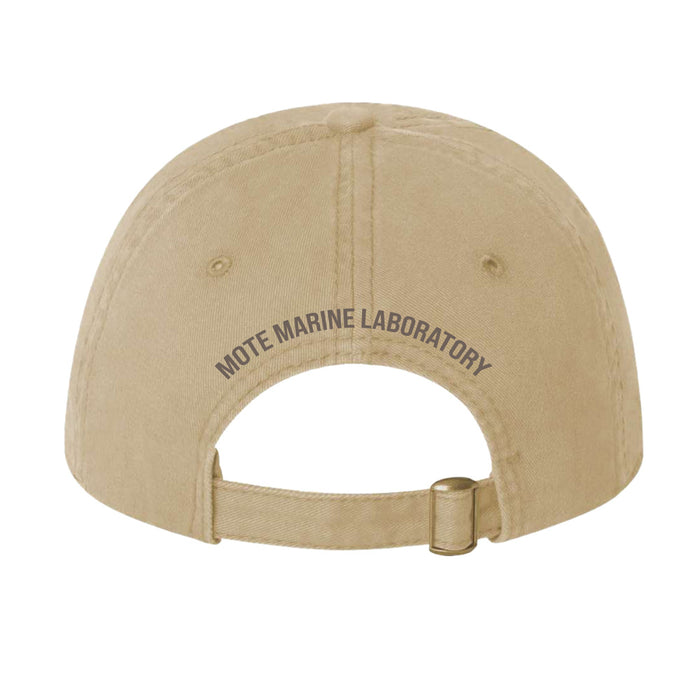 Back view of the Mote Marine Laboratory Manatee Cap in beige, featuring “MOTE MARINE LABORATORY” printed above the adjustable strap and metal buckle—a stylish nod to ocean conservation.