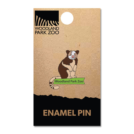 The Woodland Park Zoo Tree Kangaroo Pin features a tree kangaroo on green grass and comes on a brown backing card with the zoo’s black logo—ideal for wildlife conservation fans.