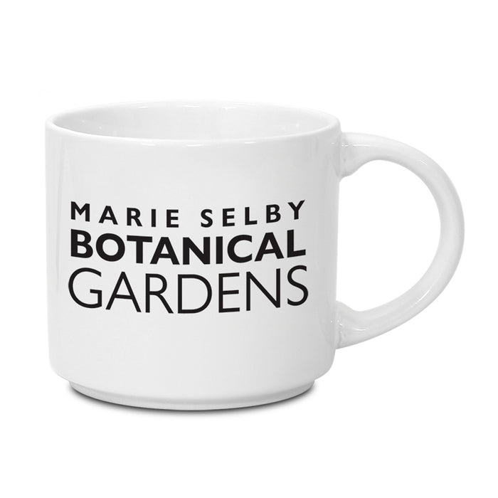 White ceramic Marie Selby Botanical Gardens Logo Mug with the name printed in black on the front.