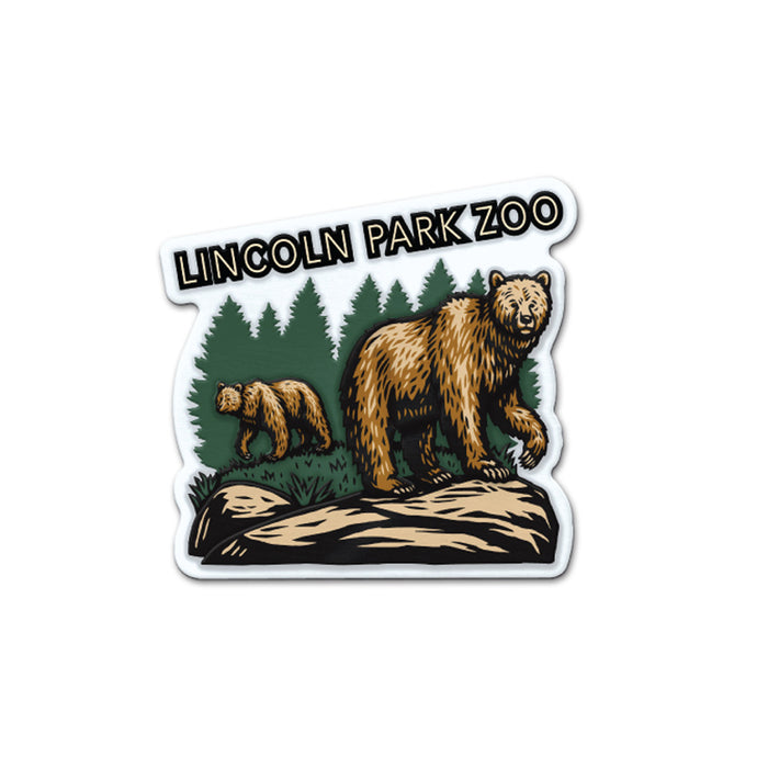 Magnet featuring an illustration of two brown bears on rocks with pine trees in the background, celebrating wildlife conservation. The text above reads “LINCOLN PARK ZOO.” The Lincoln Park Zoo Brown Bear Scene Magnet is perfect for any magnet collector or zoo enthusiast.
