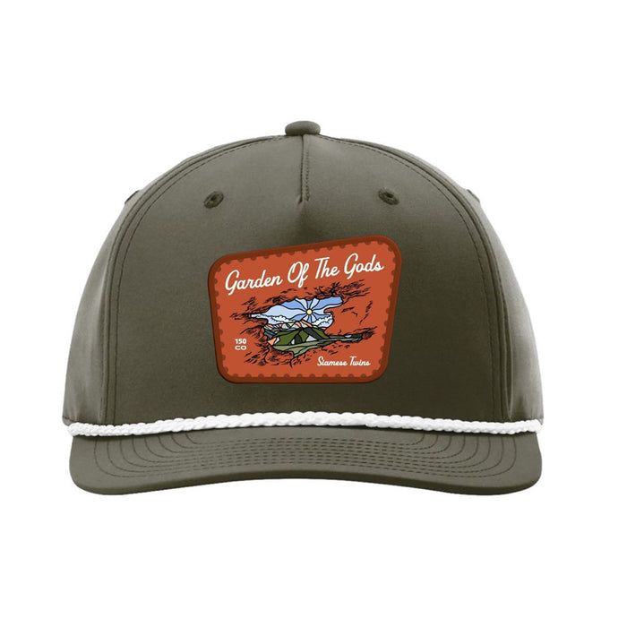 Celebrate the 150th Anniversary of this iconic landmark with the Garden of the Gods Colorado 150th Anniversary Rope Cap. This olive green rope hat features a mountain scene patch with “Garden Of The Gods” in white script, and is accented by a white braided rope above the brim—making it a perfect keepsake for any fan of Colorado’s natural beauty.