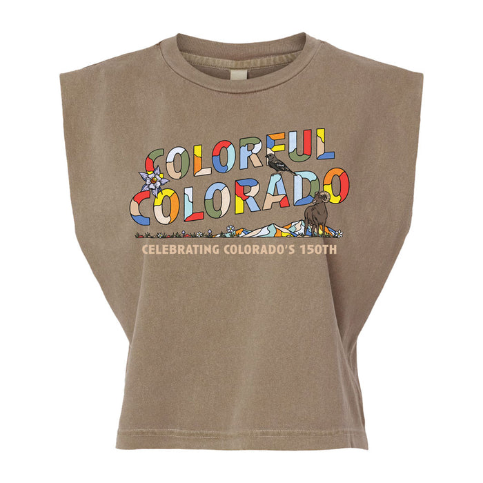 The Garden of the Gods Colorful Colorado 150th Women’s T-Shirt is a brown sleeveless top featuring colorful “Colorful Colorado” text with mountain and animal graphics inspired by Garden of the Gods, along with a beige banner that reads “Celebrating Colorado’s 150th.”.