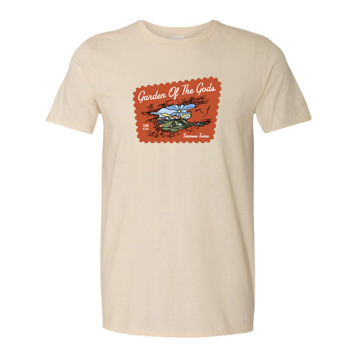 The Garden of the Gods Colorado 150th Anniversary T-Shirt is a beige tee featuring a red postage-stamp design with mountains, the iconic Siamese Twins rock formation, and the words “Garden Of The Gods” with “Scenic Route” written underneath—a perfect tribute to this milestone anniversary.