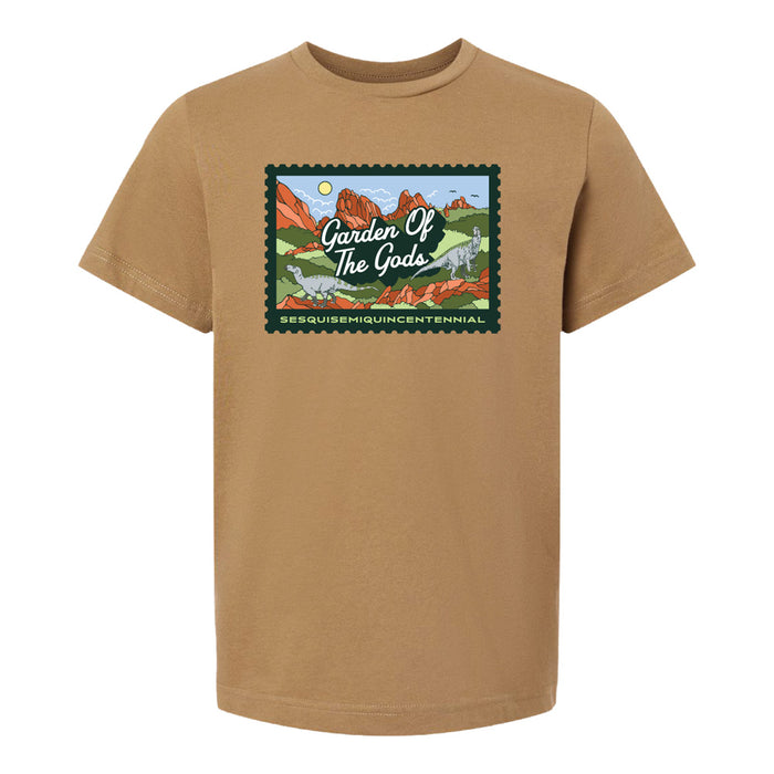The Garden of the Gods Colorado 150th Anniversary Youth T-Shirt showcases a tan design with a postcard-style graphic depicting red rock formations, green trees, and mountains, along with the text “Garden Of The Gods” and “Colorado 150th Anniversary.”.