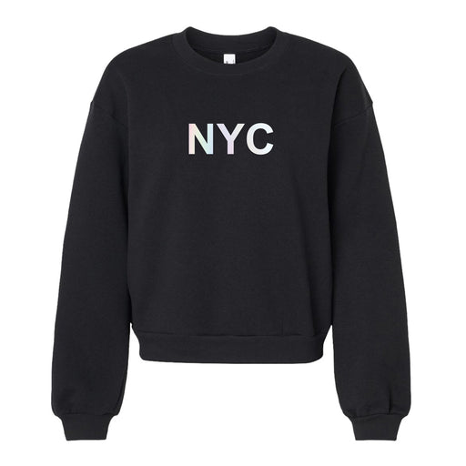 Edge NYC Foil Bauhaus Women’s Crew Sweatshirt features a black crewneck design with bold, light-colored “NYC” lettering across the chest. Inspired by Bauhaus style, this women’s sweatshirt offers long sleeves and a relaxed fit.