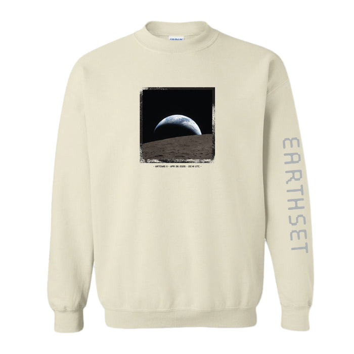 Cream-colored Artemis Crew Sweatshirt featuring a rectangular graphic of the Earth rising over the moon’s surface on the chest and the text EARTHSET printed vertically down the left sleeve.