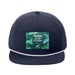 The Seattle Aquarium Old Stove Brewing Co. Rope Cap is a navy blue cap with a white rope detail above the brim, showcasing a vibrant patch that reads “One Ocean Pale Ale” alongside ocean-themed illustrations. This cap was created in collaboration with Old Stove Brewing Co., inspired by the spirit of the Seattle Aquarium.