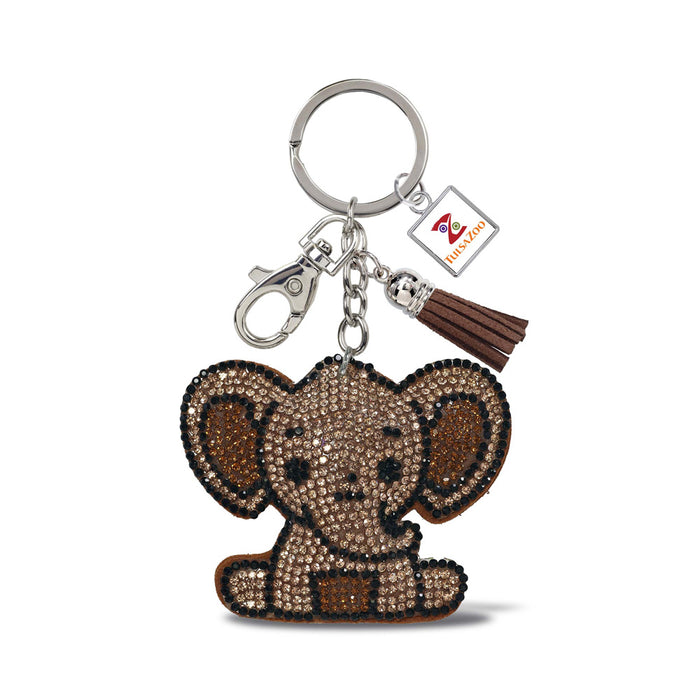The Tulsa Zoo Sparkle Elephant Keychain features a rhinestone-studded brown elephant charm with large ears, a tassel, lobster clasp, and logo tag—perfect for Tulsa Zoo fans and wildlife enthusiasts.