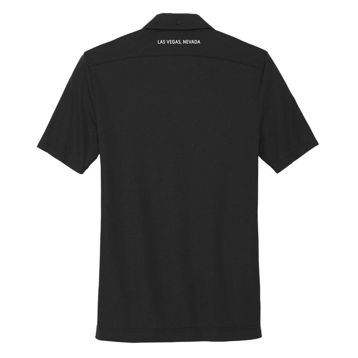 The Mob Museum Fuggedaboutit Button Up Polo T-Shirt in black is shown from the back, featuring “LAS VEGAS, NEVADA” in small white text near the collar.