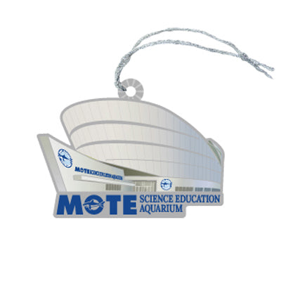 The Mote Marine Laboratory Building Ornament is shaped like the Mote Science Education Aquarium, features the official Mote Marine Laboratory logo with blue text, and includes a silver string for hanging—making this unique marine ornament a perfect tribute to ocean conservation.