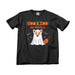 Celebrate Halloween in style with the Zoo Knoxville Boo at the Zoo T-Shirt! This black tee showcases a cute cartoon red panda dressed as a ghost, surrounded by playful bats. Vibrant orange and yellow lettering above the design reads “Boo at the Zoo Zoo Knoxville,” making it a must-have for animal lovers and fans of festive fun.