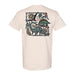 Light beige t-shirt with a back graphic featuring a brontosaurus, stegosaurus, and pterodactyl in a prehistoric landscape with a volcano.