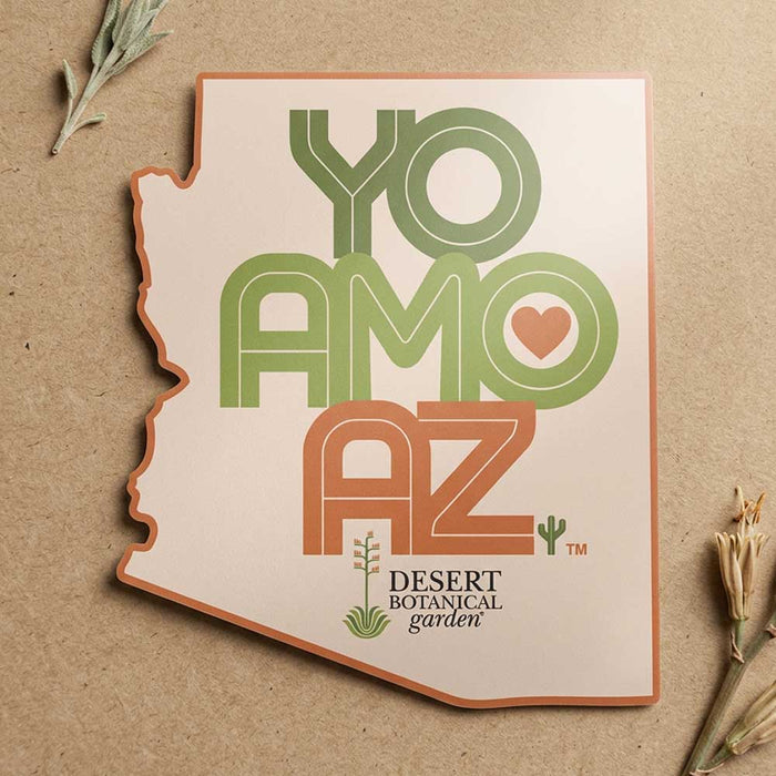 Desert Botanical Garden Yo Amo AZ sticker in an Arizona-shaped die-cut design featuring the text YO AMO AZ with a heart inside the O and the Desert Botanical Garden logo at the bottom.