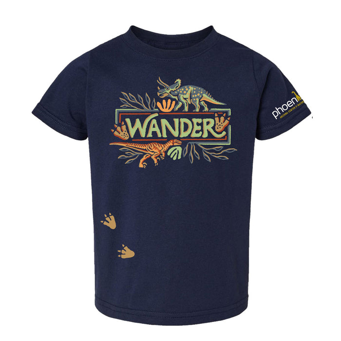 Navy blue t-shirt with a WANDER graphic featuring dinosaurs, foliage, and footprints.